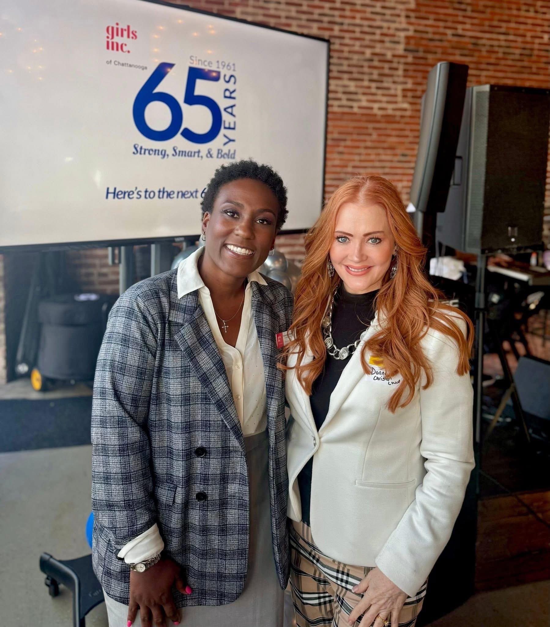 Donna Christian-Lowe with a Girls Inc. of Chattanooga representative