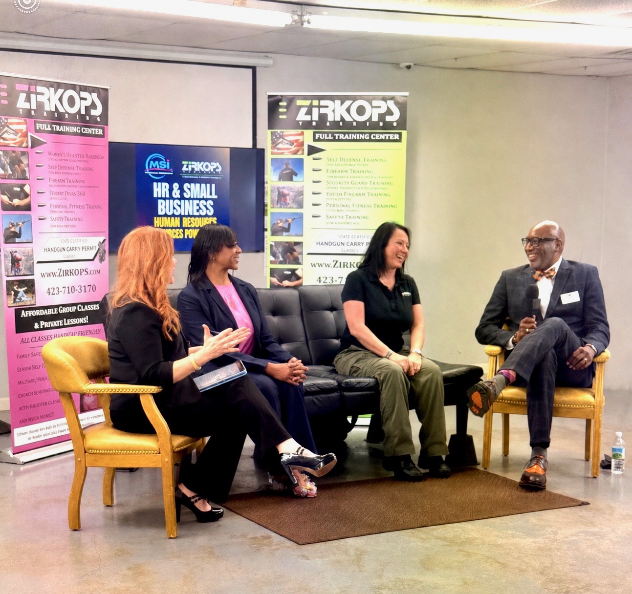HR Power Panel participants sharing a light moment during the discussion