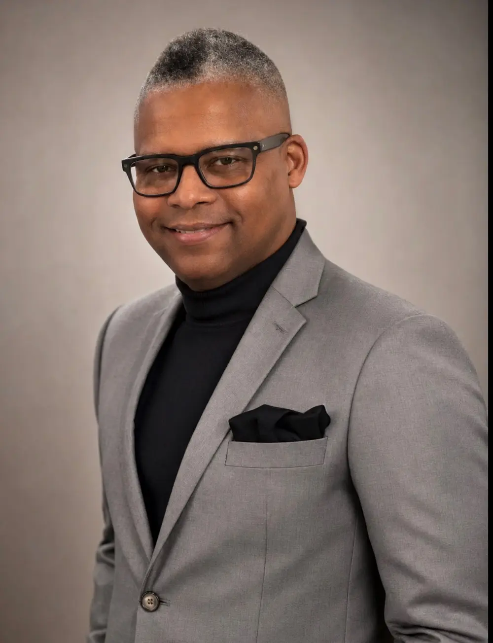 Marty wearing a grey business suit