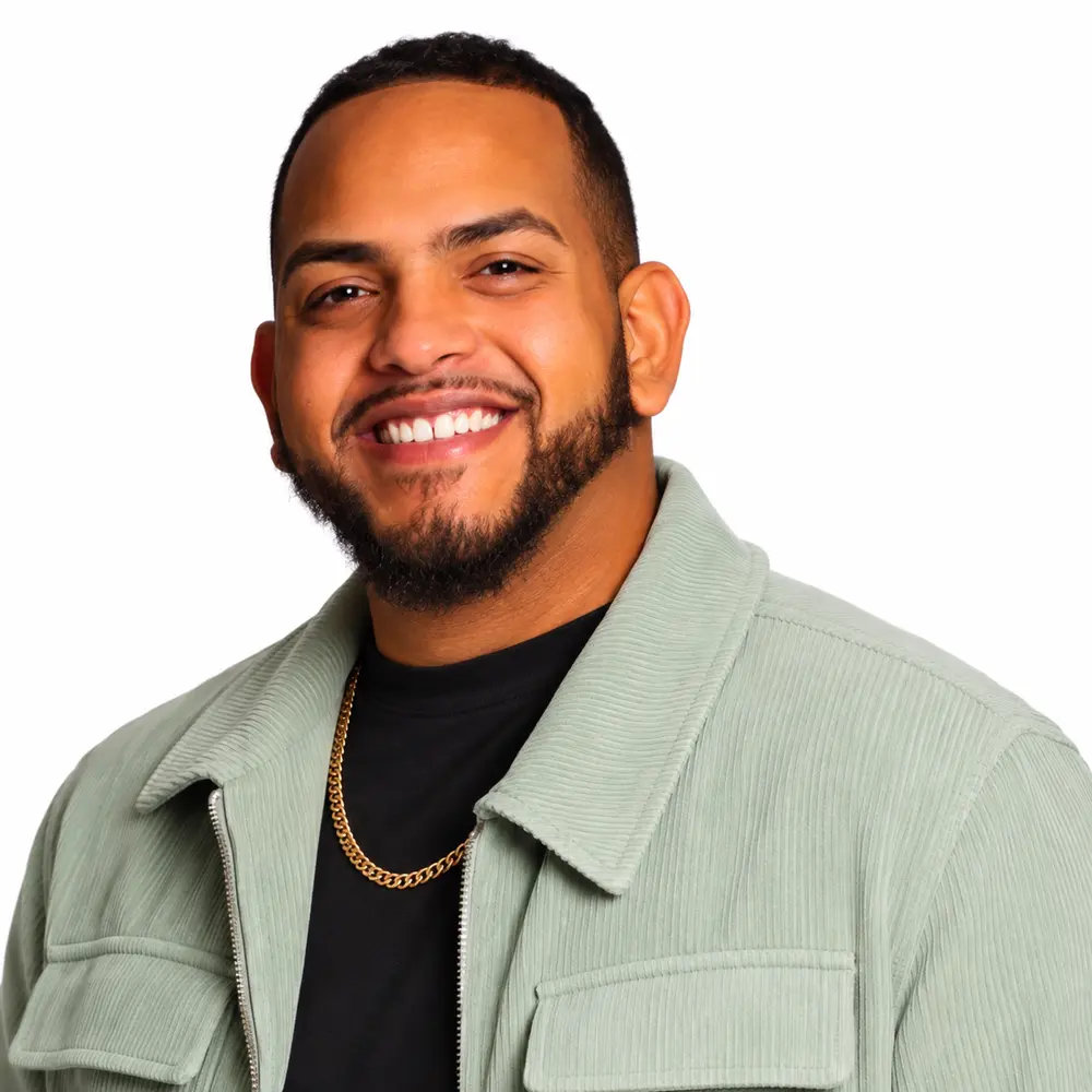 Mateo wearing a light green jacket